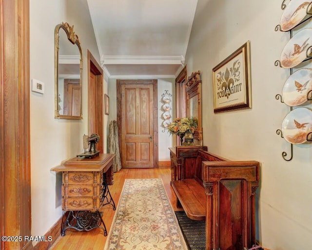 122 Lee St, New Iberia, LA 70560 - foyer featuring light wood finished floors and ornamental molding