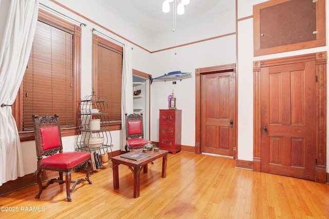 122 Lee St, New Iberia, LA 70560 - living area with light wood-style floors, baseboards, and a ceiling fan