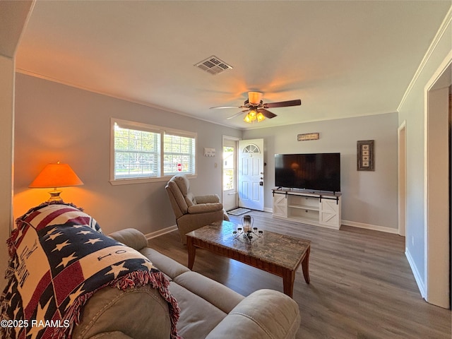 230 Glenwood Ave, Morgan City, LA 70380 - living area featuring baseboards, wood finished floors, crown molding, and ceiling fan