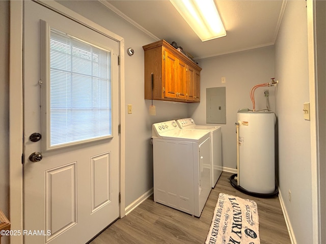 230 Glenwood Ave, Morgan City, LA 70380 - laundry room with water heater, electric panel, cabinet space, washer and dryer, and light wood finished floors