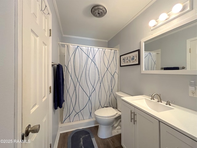 230 Glenwood Ave, Morgan City, LA 70380 - full bath featuring wood finished floors, vanity, curtained shower, crown molding, and toilet