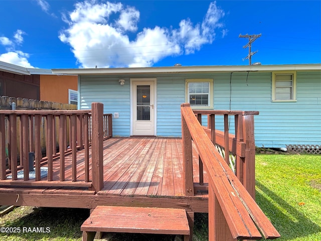 230 Glenwood Ave, Morgan City, LA 70380 - wooden deck featuring a yard