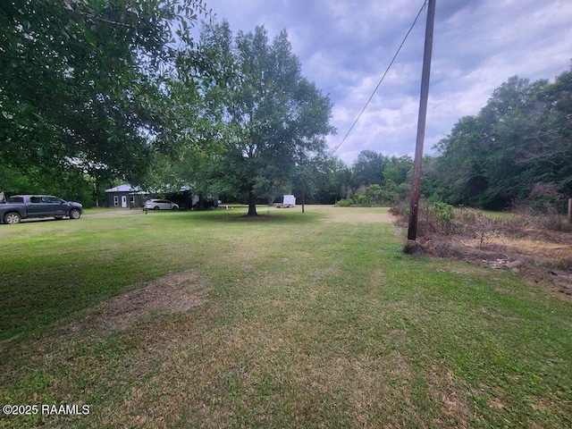 view of yard with a carport