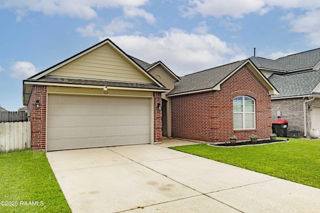 ranch-style house with an attached garage, brick siding, driveway, a front yard, and a shingled roof