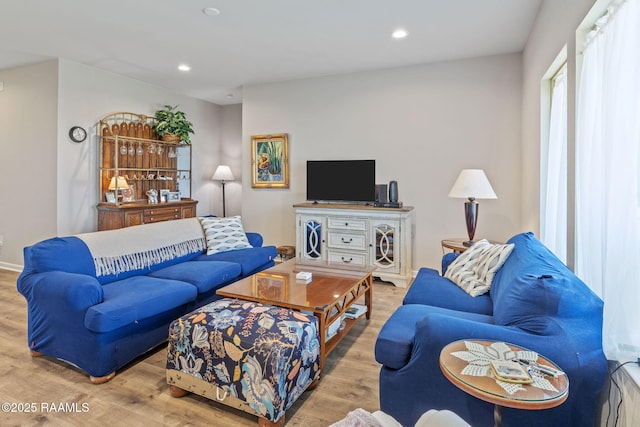 4058 Starling Pl, Jennings, LA 70546 - living area with recessed lighting and wood finished floors