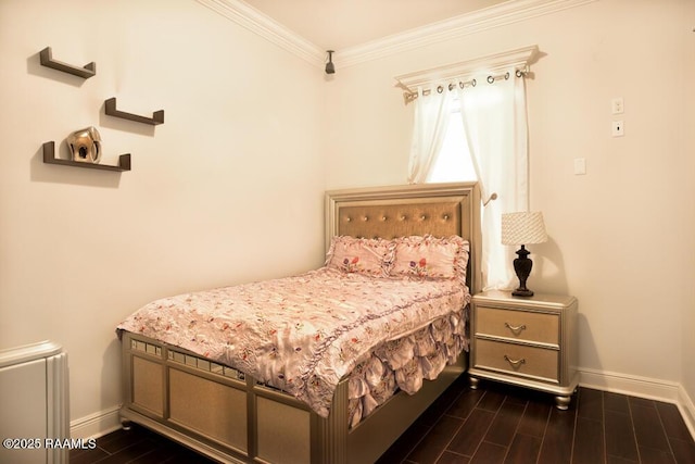 bedroom featuring baseboards, ornamental molding, dark wood-style floors, and radiator heating unit