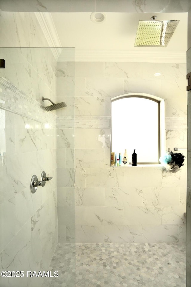 full bath featuring tiled shower