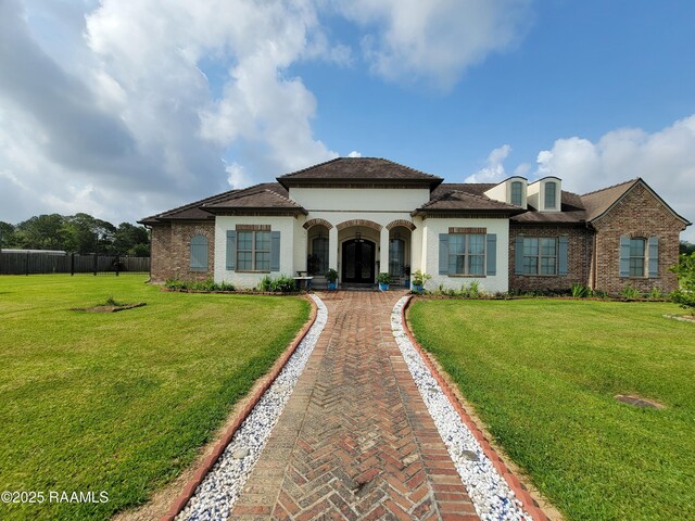 view of front facade featuring brick siding