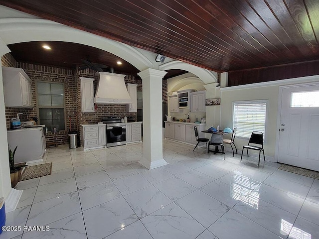 4300 Gerald James Dr, New Iberia, LA 70560 - view of patio / terrace with exterior kitchen, a ceiling fan, and outdoor dining space