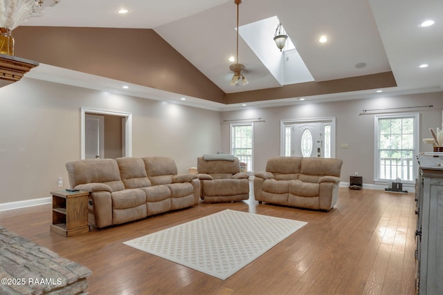 16634 W La Highway 330, Abbeville, LA 70510 - living room featuring high vaulted ceiling, baseboards, wood finished floors, and recessed lighting