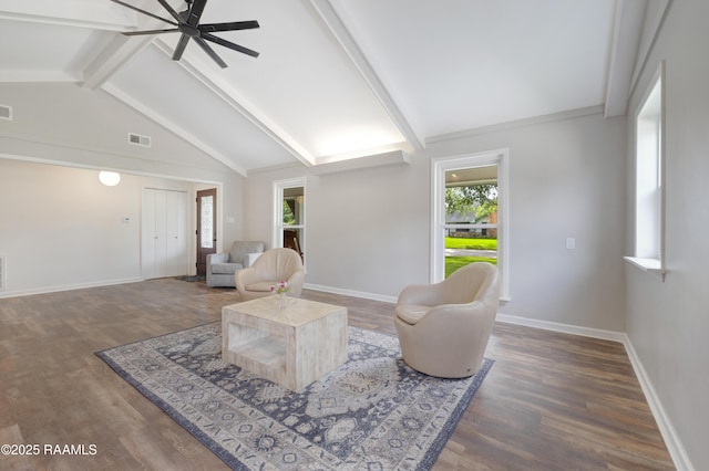 513 Emmeline St, New Iberia, LA 70563 - living area featuring plenty of natural light, a ceiling fan, wood finished floors, and baseboards