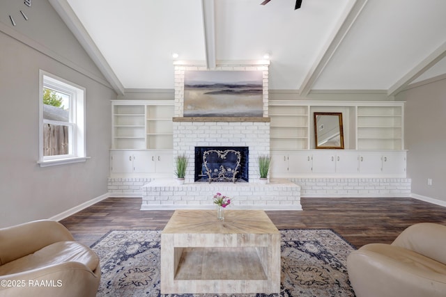 513 Emmeline St, New Iberia, LA 70563 - living room featuring baseboards, dark wood-style flooring, a fireplace, and built in shelves