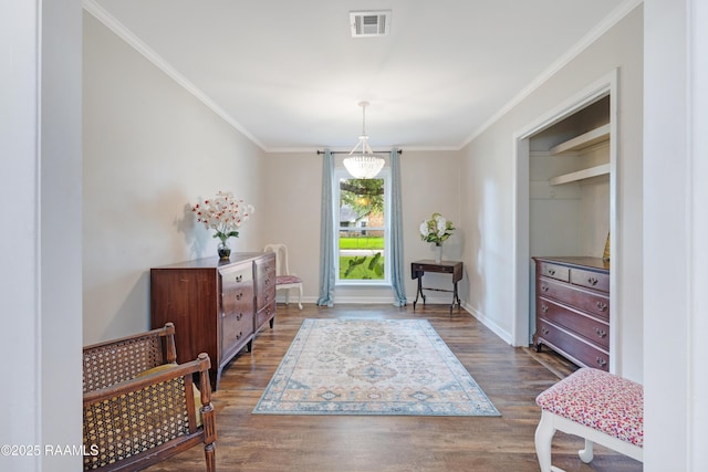 513 Emmeline St, New Iberia, LA 70563 - foyer entrance with ornamental molding, dark wood finished floors, and baseboards