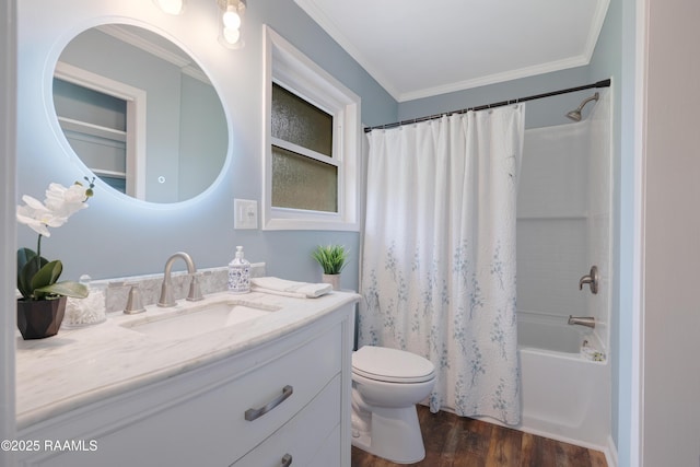 513 Emmeline St, New Iberia, LA 70563 - full bath featuring toilet, wood finished floors, vanity, ornamental molding, and shower / tub combo