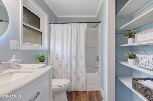 513 Emmeline St, New Iberia, LA 70563 - bathroom featuring crown molding, toilet, wood finished floors, shower / bath combo, and vanity