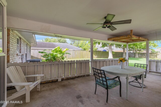 513 Emmeline St, New Iberia, LA 70563 - sunroom / solarium with ceiling fan, outdoor dining space, and plenty of natural light