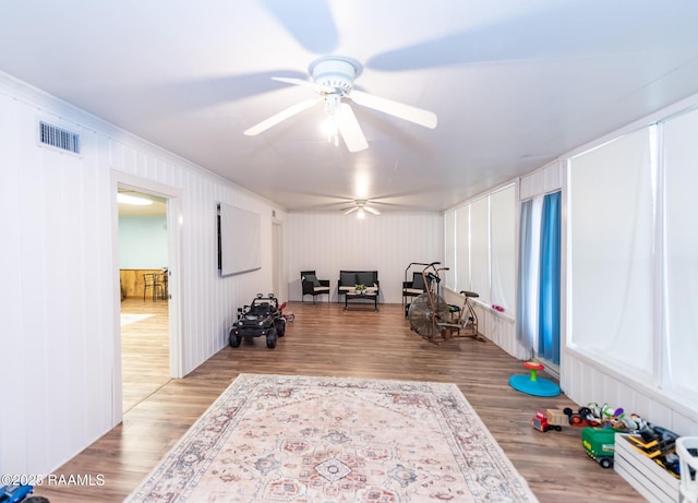 2405 S Chataignier Rd, Ville Platte, LA 70586 - workout area with ceiling fan, wood finished floors, and crown molding