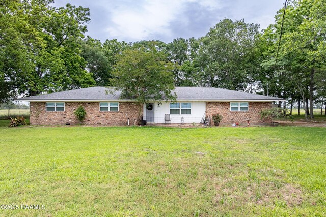 2405 S Chataignier Rd, Ville Platte, LA 70586 - ranch-style home with brick siding and a front lawn