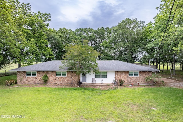 2405 S Chataignier Rd, Ville Platte, LA 70586 - ranch-style home featuring brick siding, a front lawn, view of scattered trees, and roof with shingles