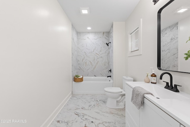 bathroom featuring marble look tile flooring, toilet, shower / washtub combination, vanity, and baseboards
