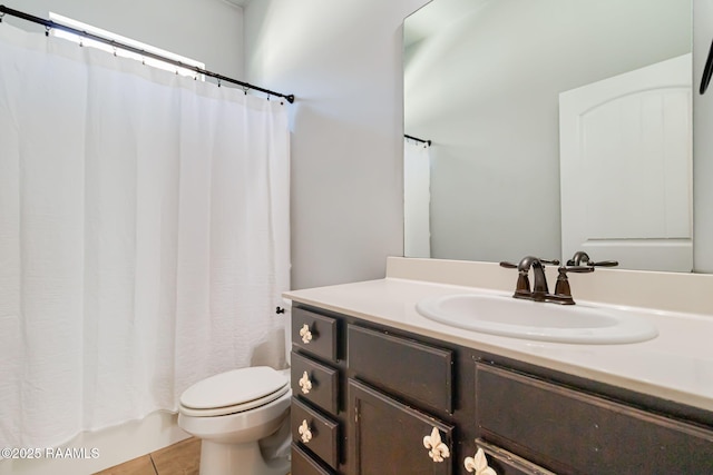 123 Laurel Grove Blvd, Youngsville, LA 70592 - bathroom with tile patterned flooring, toilet, and vanity