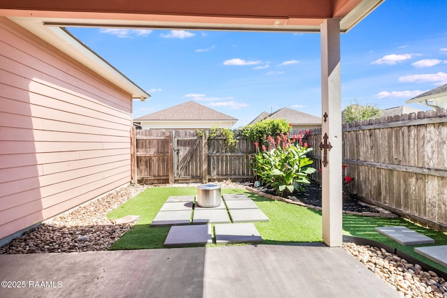 123 Laurel Grove Blvd, Youngsville, LA 70592 - fenced backyard with a patio