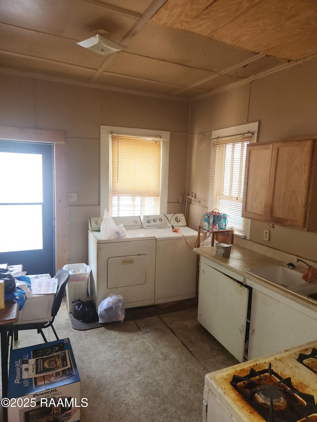713 E Vermilion St, Lafayette, LA 70501 - laundry area featuring washer and dryer and cabinet space