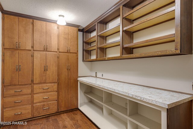 207 Beverly Dr, Lafayette, LA 70503 - spacious closet with dark wood-style floors