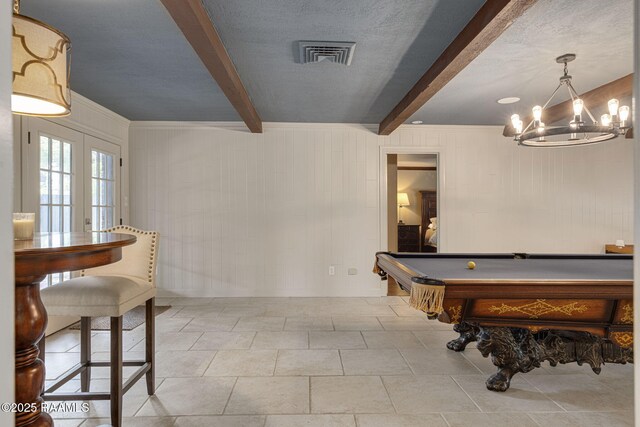 207 Beverly Dr, Lafayette, LA 70503 - game room with beamed ceiling, a chandelier, and billiards