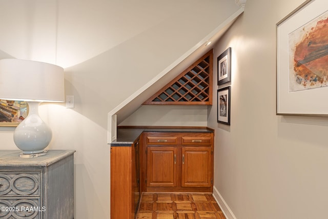 207 Beverly Dr, Lafayette, LA 70503 - wine room with baseboards and a dry bar