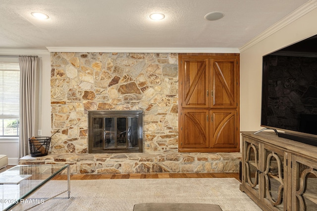 207 Beverly Dr, Lafayette, LA 70503 - living room with crown molding, a fireplace, and a textured ceiling