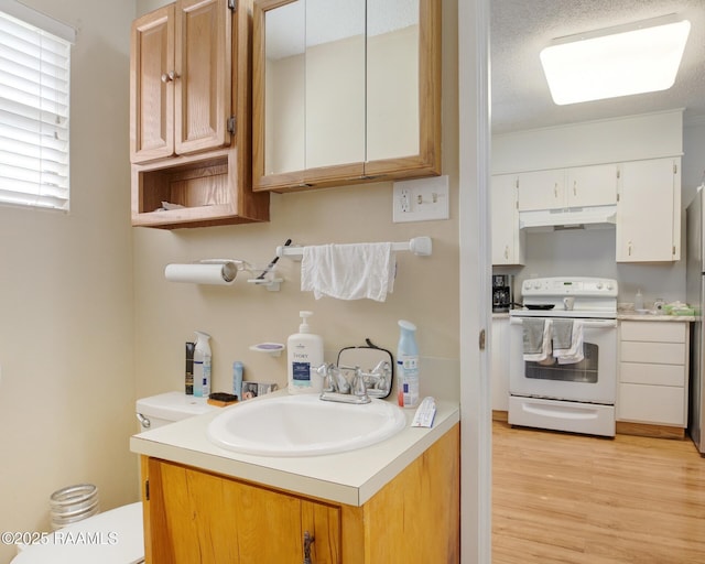 114 Marina Loop, Scott, LA 70583 - half bath with wood finished floors, toilet, and vanity