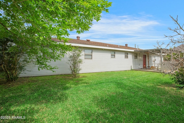 114 Marina Loop, Scott, LA 70583 - rear view of property featuring a yard