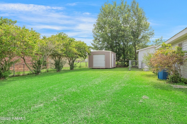 114 Marina Loop, Scott, LA 70583 - view of yard with a storage unit and an outbuilding