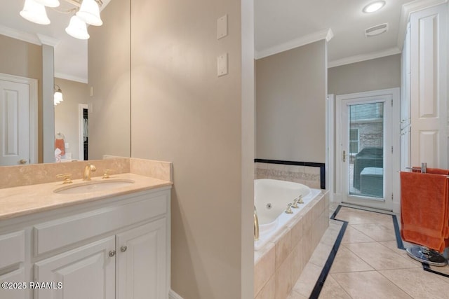 full bathroom featuring tile patterned floors, crown molding, a jetted tub, vanity, and baseboards