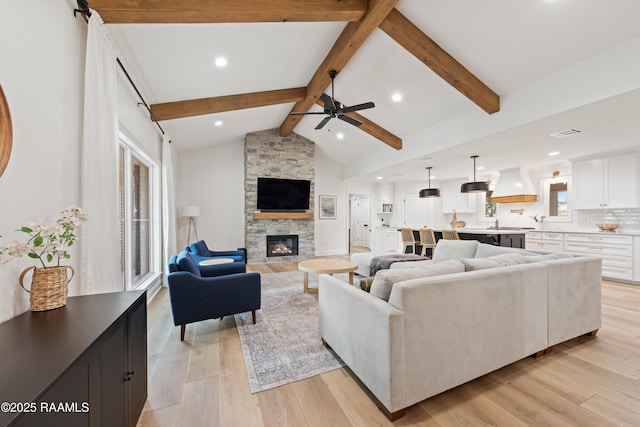 436 Brentwood Blvd, Lafayette, LA 70503 - living area with a fireplace, light wood-style flooring, ceiling fan, and recessed lighting