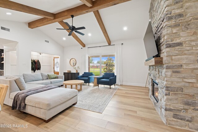 436 Brentwood Blvd, Lafayette, LA 70503 - living room featuring a ceiling fan, a stone fireplace, beamed ceiling, light wood-style floors, and recessed lighting