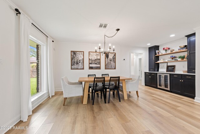 436 Brentwood Blvd, Lafayette, LA 70503 - dining area featuring a chandelier, crown molding, light wood-type flooring, baseboards, and recessed lighting