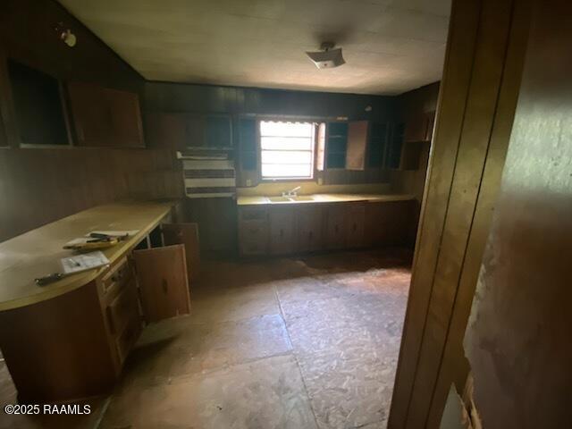 736 N Court St, Opelousas, LA 70570 - kitchen featuring light countertops and a sink