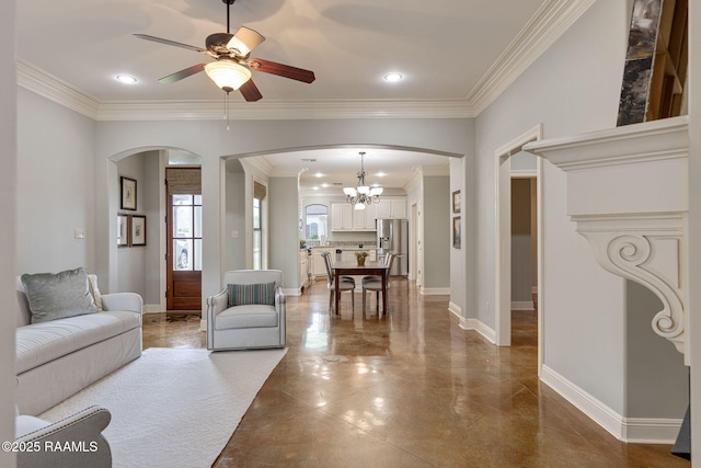109 Barataria Bay, Lafayette, LA 70508 - living area with arched walkways, ceiling fan, ornamental molding, a chandelier, and baseboards