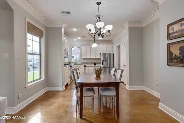 109 Barataria Bay, Lafayette, LA 70508 - dining space with concrete flooring, baseboards, ornamental molding, a chandelier, and recessed lighting