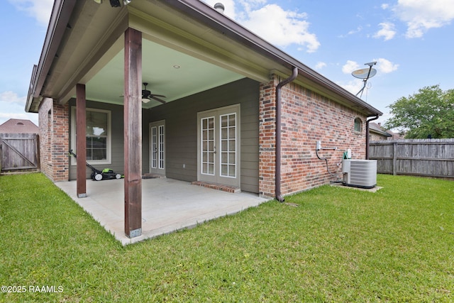 109 Barataria Bay, Lafayette, LA 70508 - back of house with a ceiling fan, brick siding, a patio area, central AC, and a gate