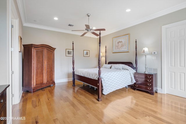 2311 Vida Shaw Rd, New Iberia, LA 70563 - bedroom with light wood finished floors, crown molding, baseboards, recessed lighting, and ceiling fan
