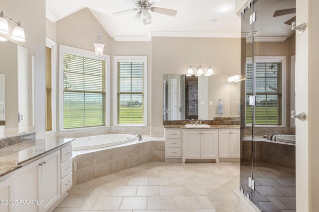 2311 Vida Shaw Rd, New Iberia, LA 70563 - bathroom featuring ceiling fan, plenty of natural light, crown molding, a bath, and lofted ceiling
