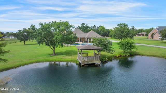 2311 Vida Shaw Rd, New Iberia, LA 70563 - dock with a water view and a lawn