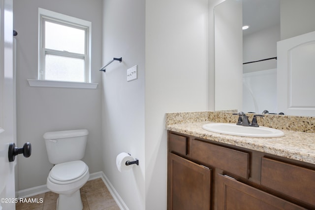 223 Moss Bluff Dr, Lafayette, LA 70507 - bathroom with toilet, baseboards, vanity, and tile patterned flooring