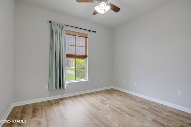 223 Moss Bluff Dr, Lafayette, LA 70507 - spare room with light wood-style floors, ceiling fan, and baseboards