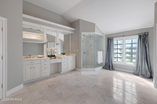 807 Cambridge Dr Res, Unit Res, Lafayette, LA 70503 - full bathroom featuring vaulted ceiling, vanity, a shower stall, marble finish flooring, and baseboards