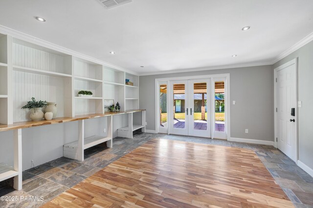 807 Cambridge Dr Res, Unit Res, Lafayette, LA 70503 - foyer entrance with stone tile floors, crown molding, french doors, baseboards, and recessed lighting