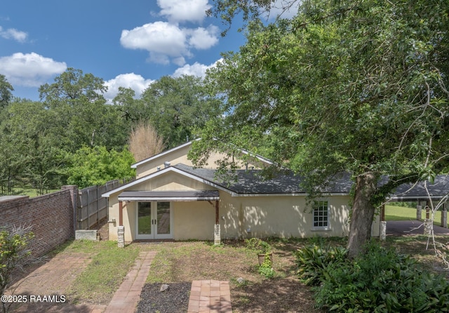 807 Cambridge Dr Res, Unit Res, Lafayette, LA 70503 - back of property featuring french doors and stucco siding